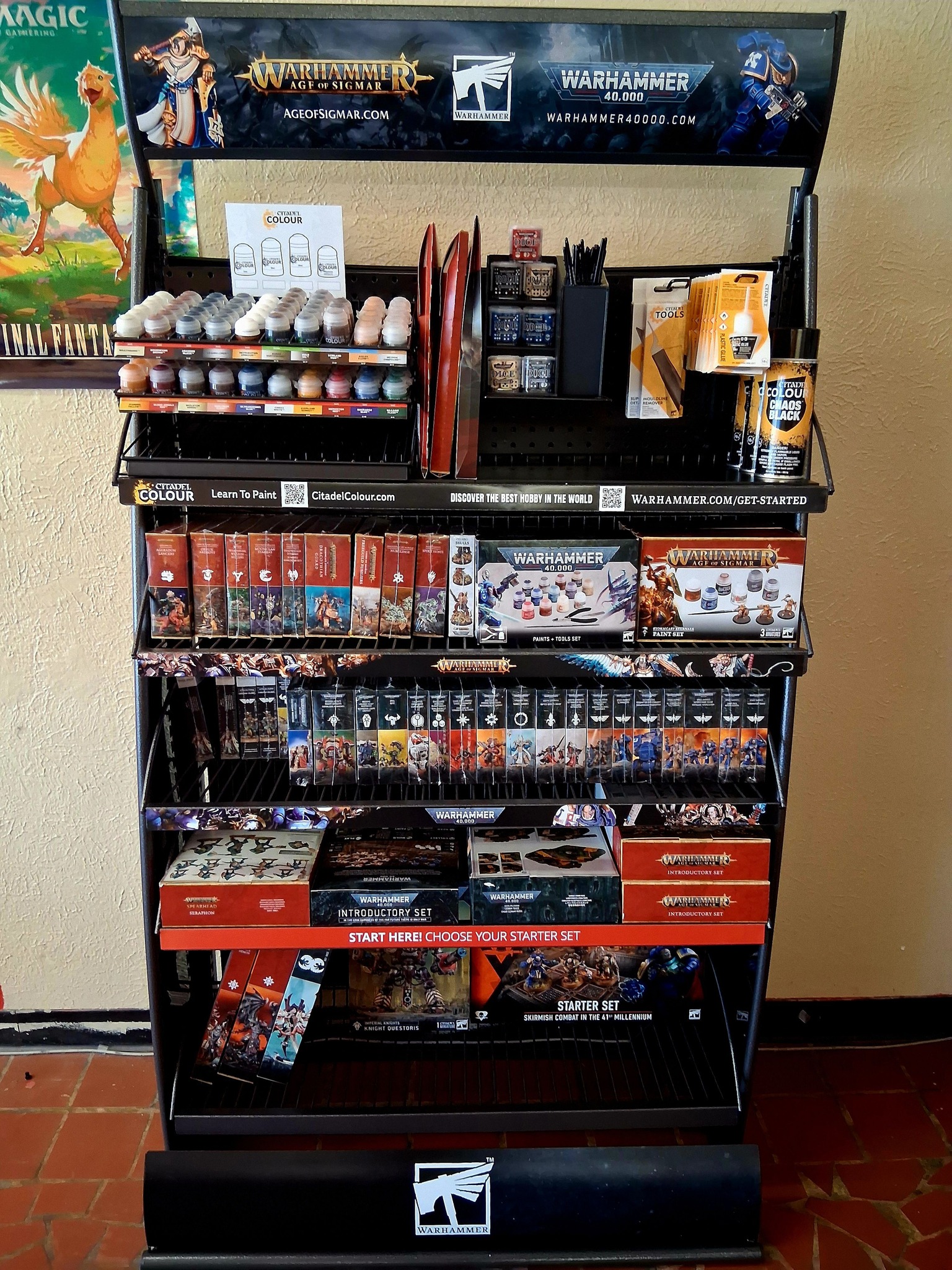 Warhammer merchandise display at Kennett Command Zone—Citadel paints, hobby tools, starter sets, and miniatures for Age of Sigmar and Warhammer 40,000